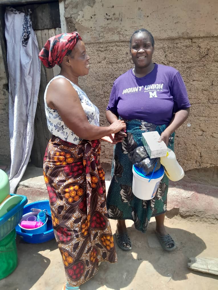 Giving to the need during an outreach in the community.